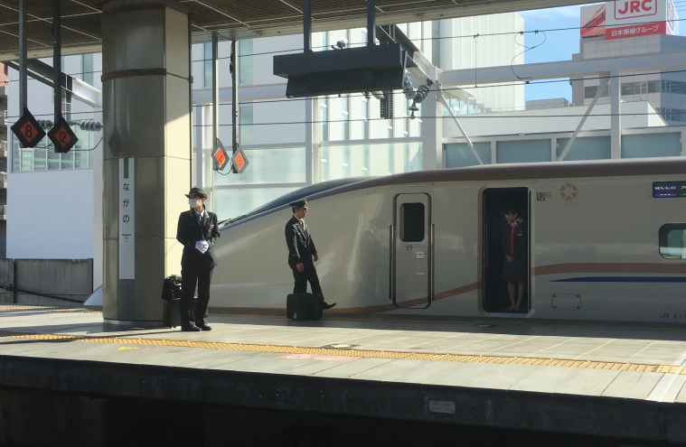 Japanese train crew ready for shift change. 